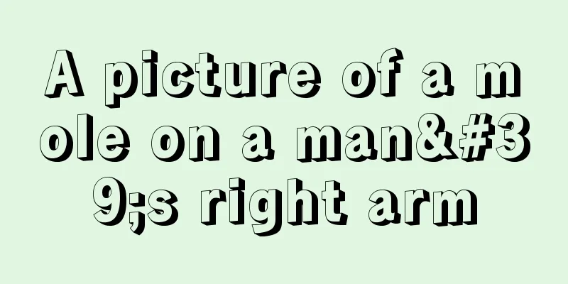 A picture of a mole on a man's right arm
