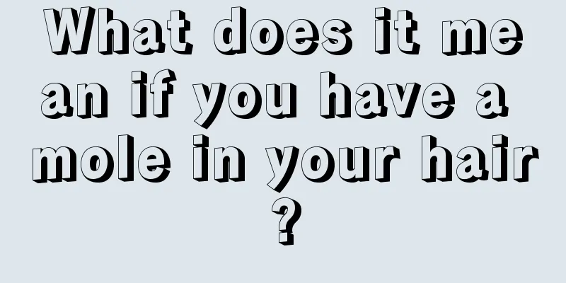 What does it mean if you have a mole in your hair?