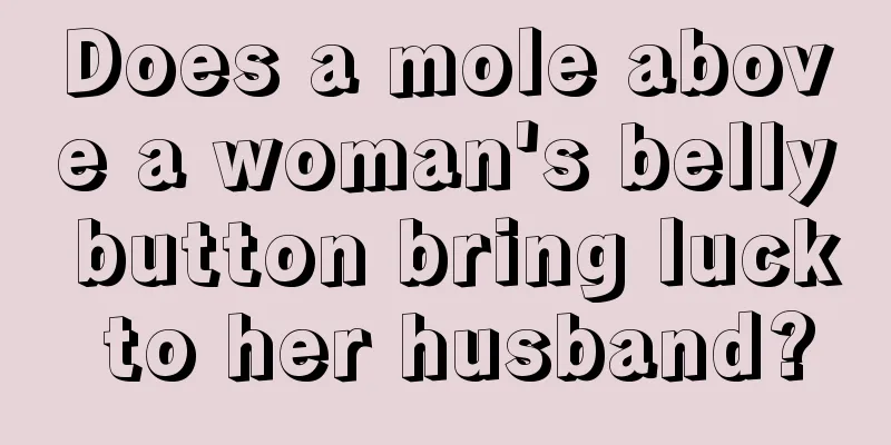 Does a mole above a woman's belly button bring luck to her husband?