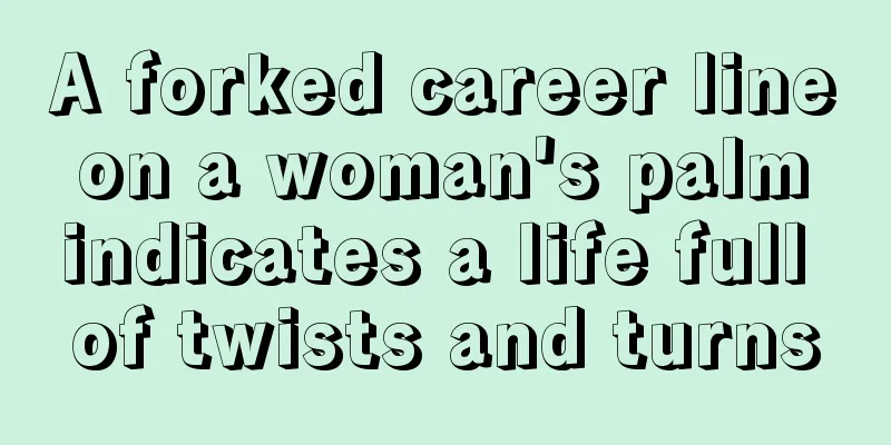 A forked career line on a woman's palm indicates a life full of twists and turns