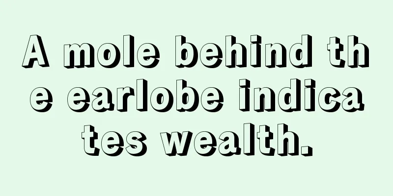 A mole behind the earlobe indicates wealth.