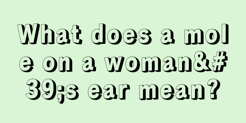 What does a mole on a woman's ear mean?