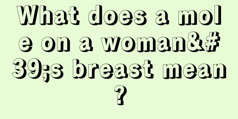 What does a mole on a woman's breast mean?