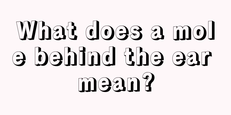 What does a mole behind the ear mean?