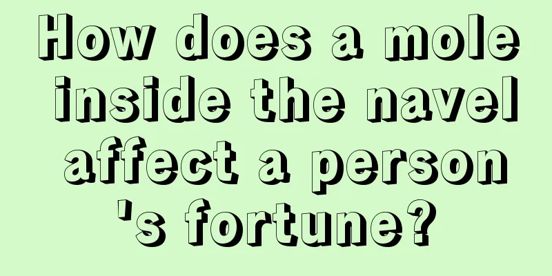 How does a mole inside the navel affect a person's fortune?