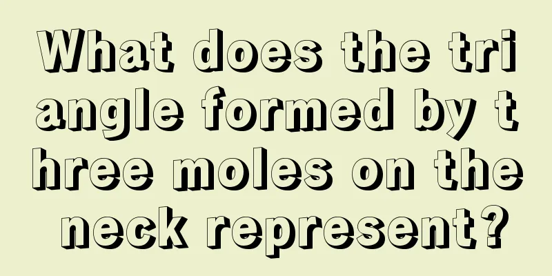 What does the triangle formed by three moles on the neck represent?