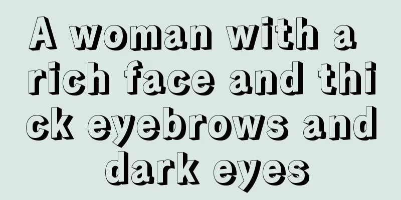 A woman with a rich face and thick eyebrows and dark eyes