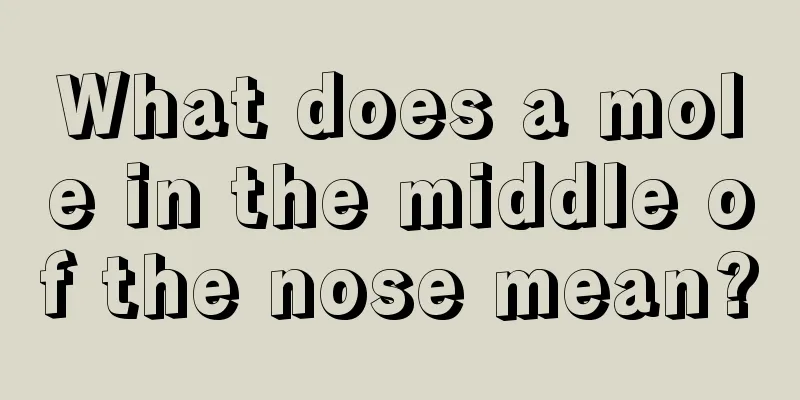 What does a mole in the middle of the nose mean?