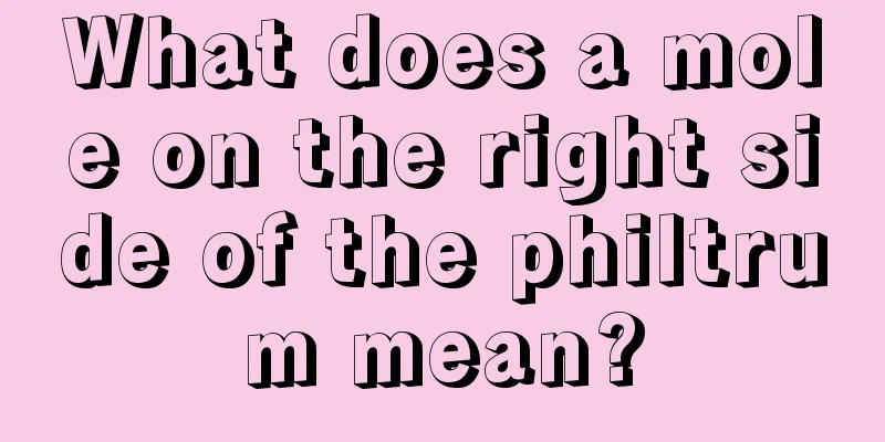 What does a mole on the right side of the philtrum mean?