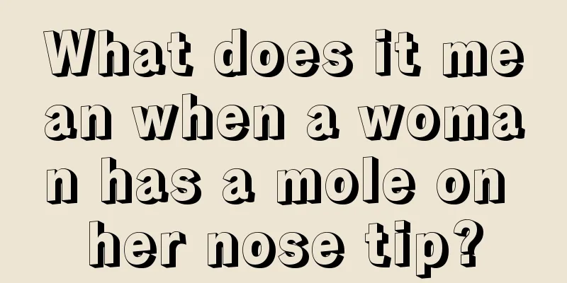 What does it mean when a woman has a mole on her nose tip?
