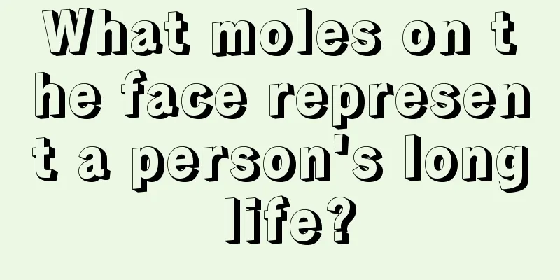 What moles on the face represent a person's long life?
