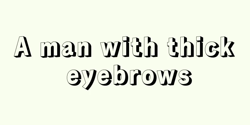 A man with thick eyebrows