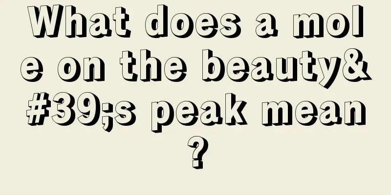 What does a mole on the beauty's peak mean?