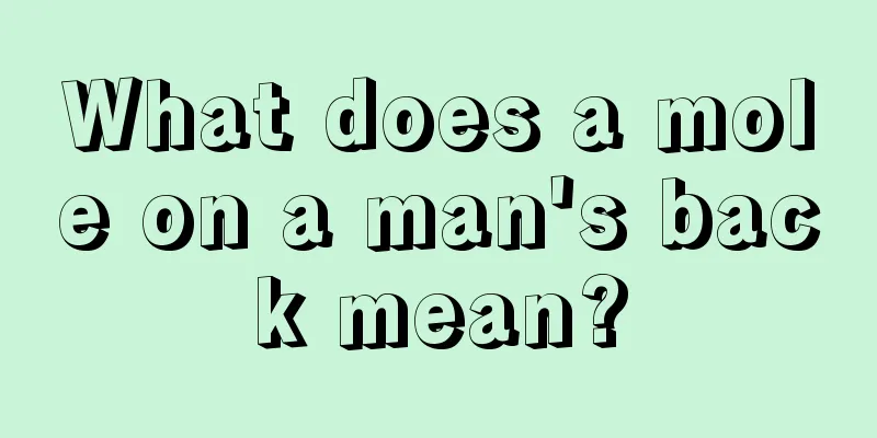 What does a mole on a man's back mean?