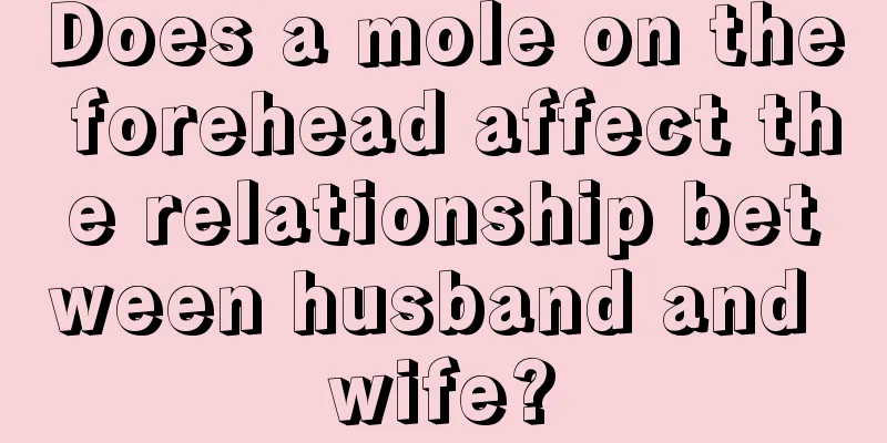 Does a mole on the forehead affect the relationship between husband and wife?