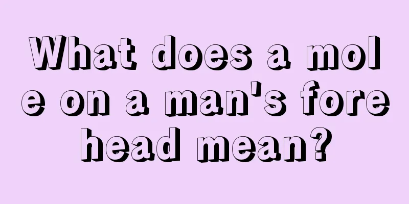 What does a mole on a man's forehead mean?