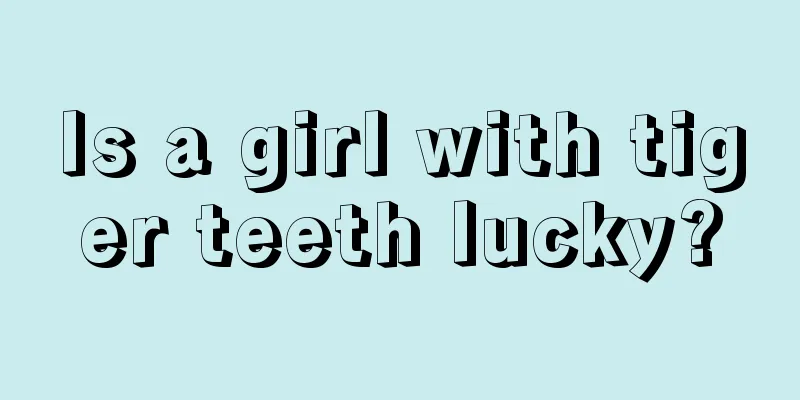 Is a girl with tiger teeth lucky?
