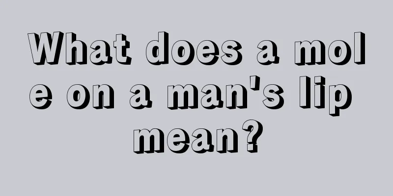 What does a mole on a man's lip mean?