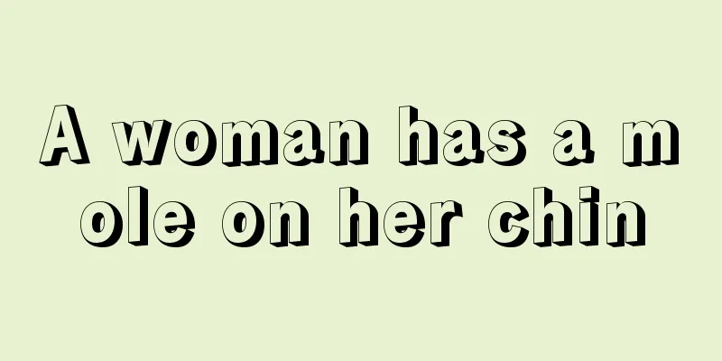 A woman has a mole on her chin