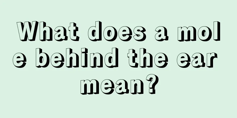 What does a mole behind the ear mean?