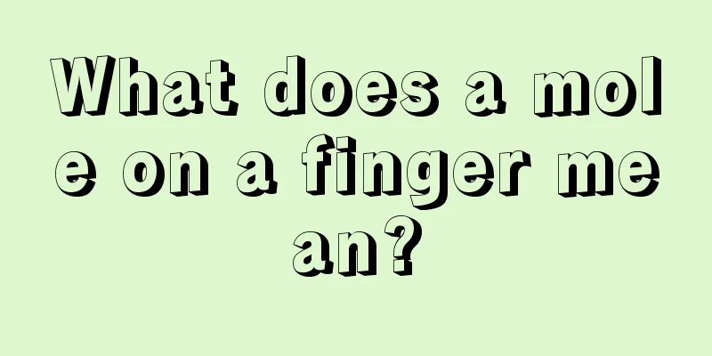 What does a mole on a finger mean?