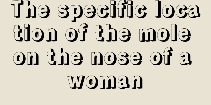 The specific location of the mole on the nose of a woman