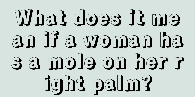 What does it mean if a woman has a mole on her right palm?