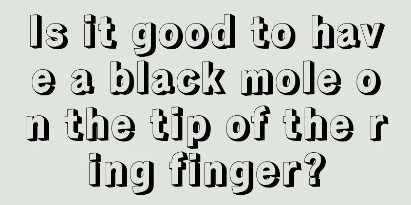 Is it good to have a black mole on the tip of the ring finger?