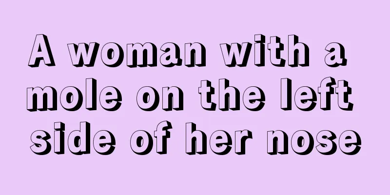 A woman with a mole on the left side of her nose
