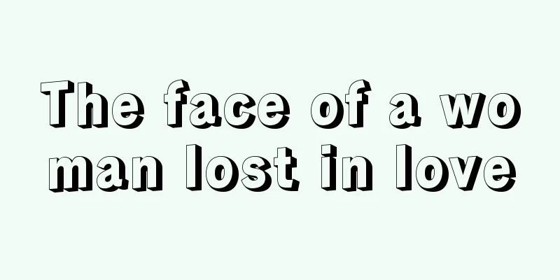 The face of a woman lost in love