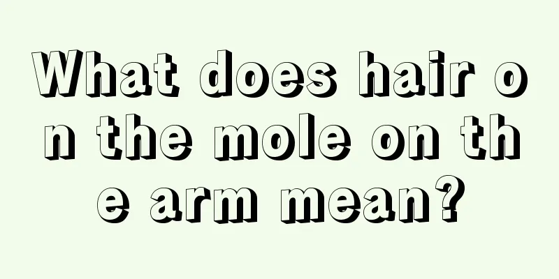 What does hair on the mole on the arm mean?