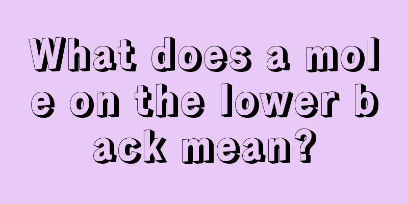 What does a mole on the lower back mean?