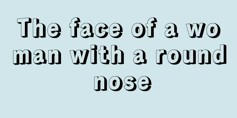 The face of a woman with a round nose