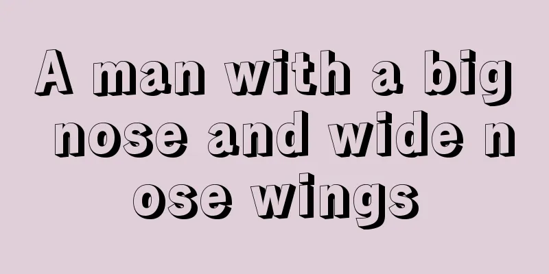 A man with a big nose and wide nose wings
