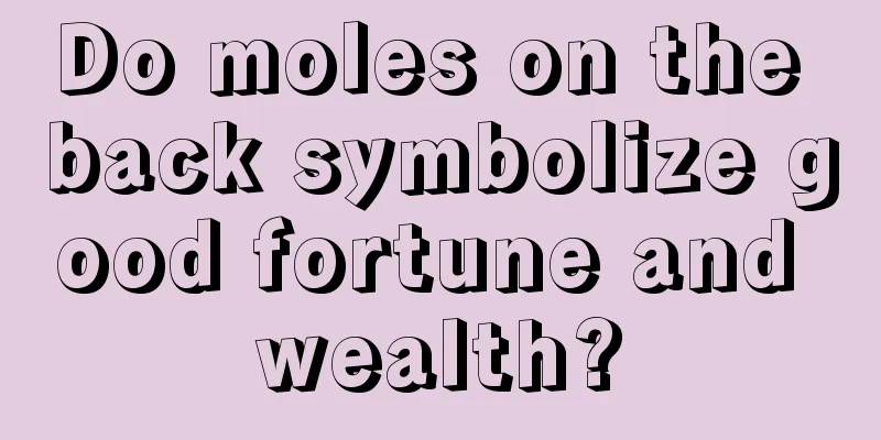 Do moles on the back symbolize good fortune and wealth?