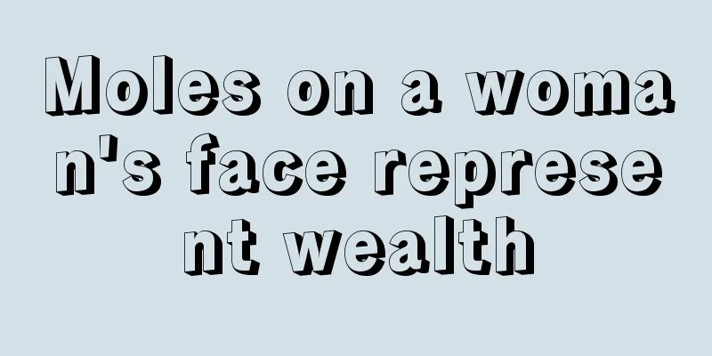 Moles on a woman's face represent wealth