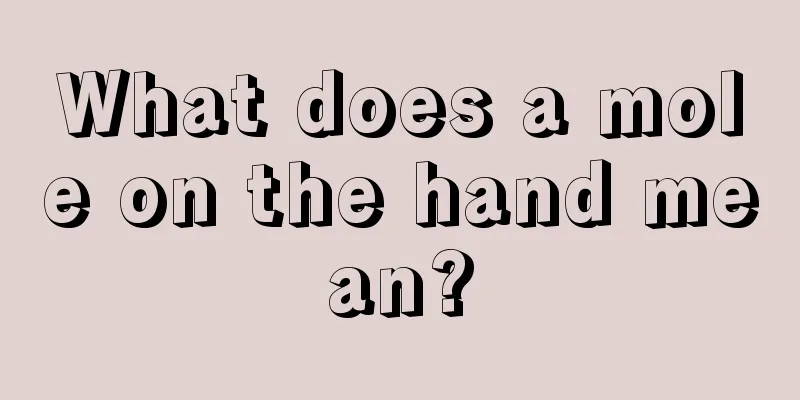 What does a mole on the hand mean?