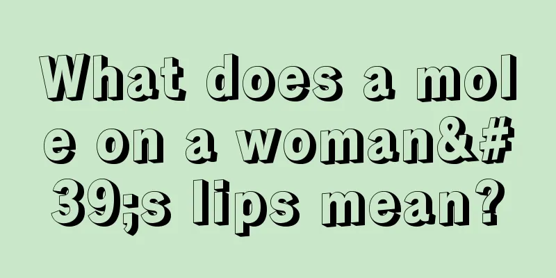 What does a mole on a woman's lips mean?