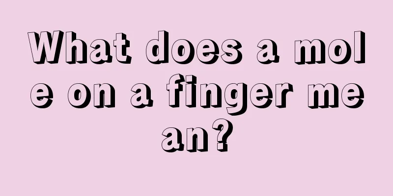 What does a mole on a finger mean?