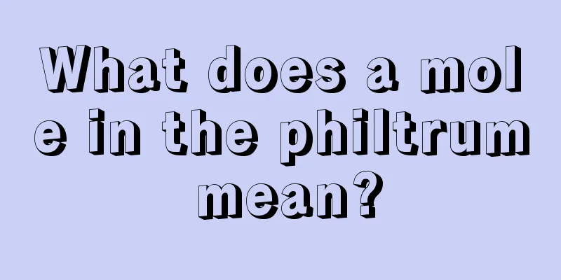 What does a mole in the philtrum mean?