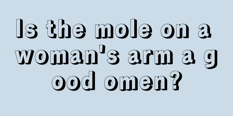 Is the mole on a woman's arm a good omen?