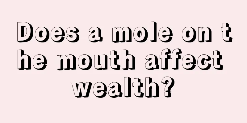 Does a mole on the mouth affect wealth?