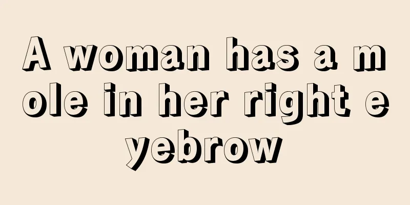 A woman has a mole in her right eyebrow