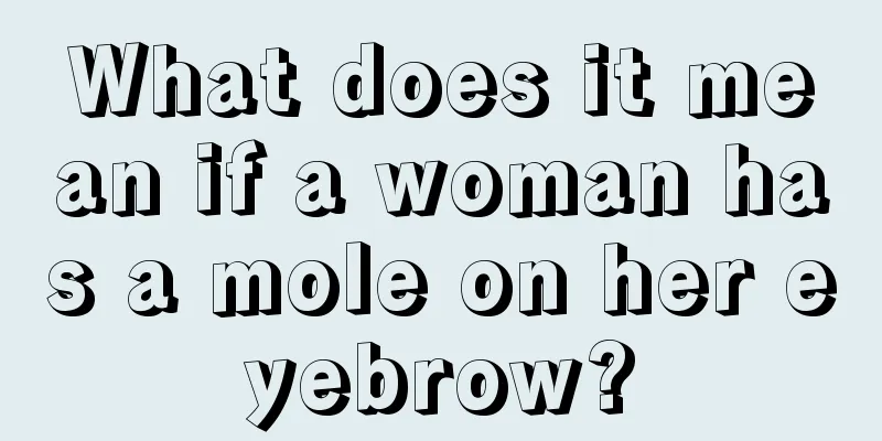 What does it mean if a woman has a mole on her eyebrow?