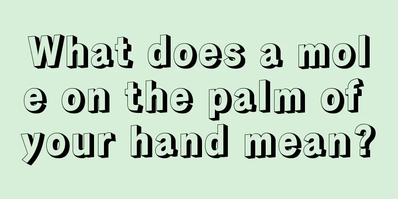 What does a mole on the palm of your hand mean?