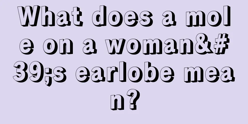 What does a mole on a woman's earlobe mean?