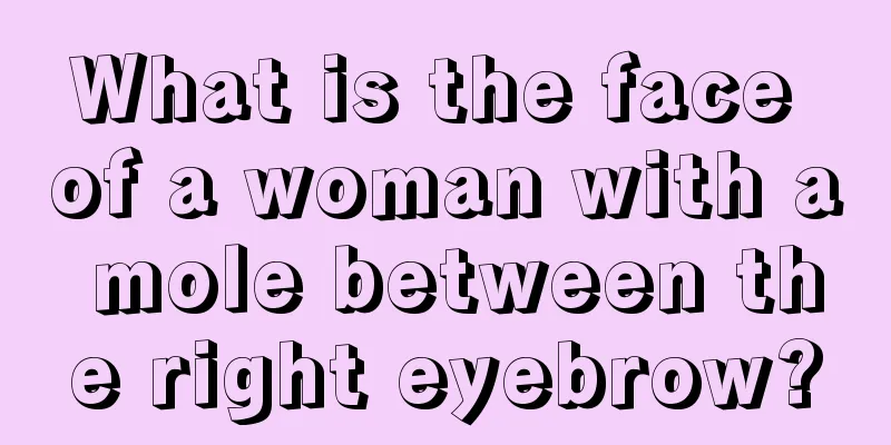 What is the face of a woman with a mole between the right eyebrow?