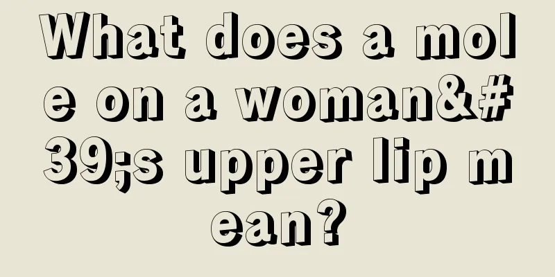 What does a mole on a woman's upper lip mean?