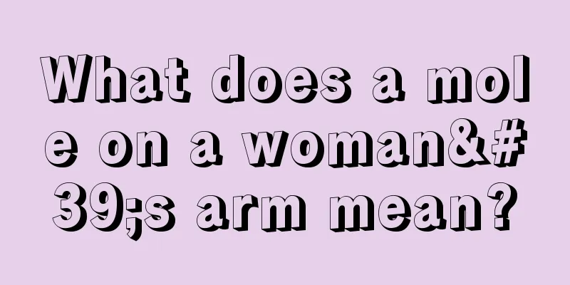 What does a mole on a woman's arm mean?