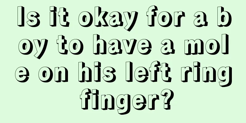 Is it okay for a boy to have a mole on his left ring finger?